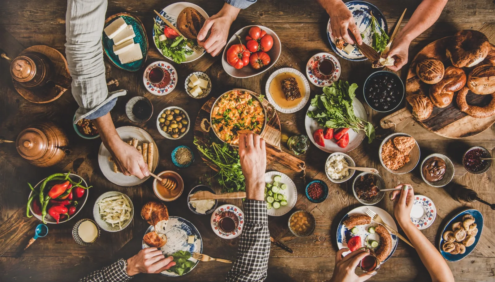 Overhead View Of People Enjoying Lavish Breakfast 2026 03 09 23 10 35 Utc