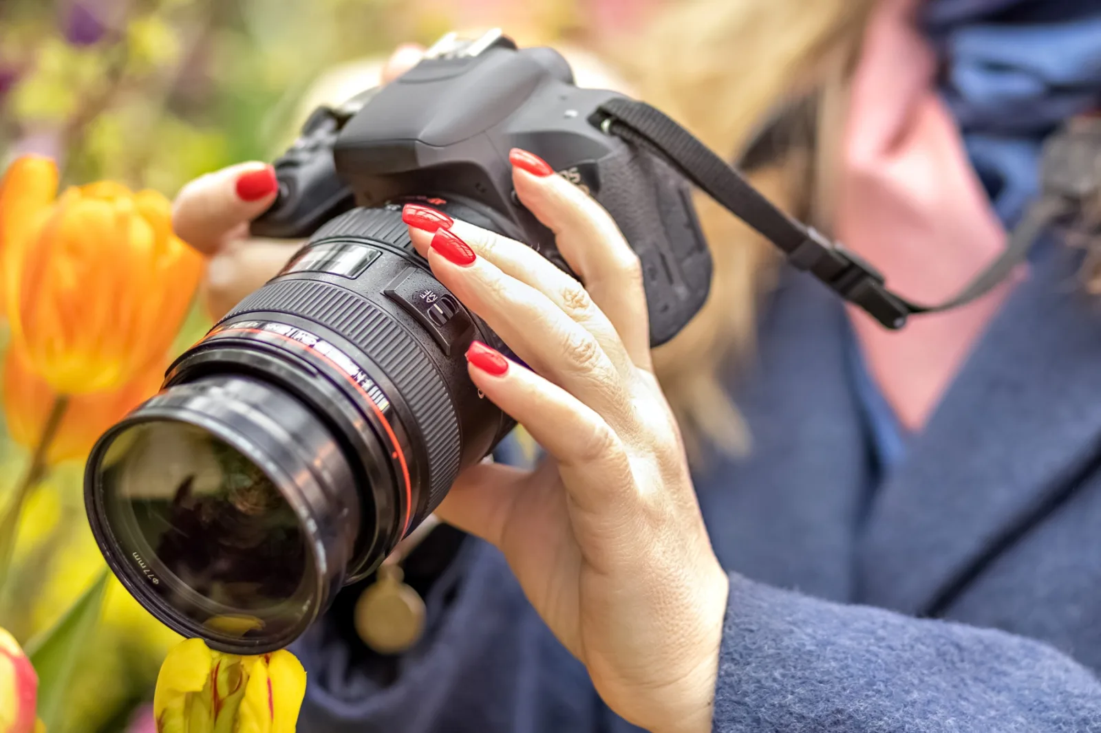 A Young Woman Takes A Photo On Camera Of Tulips In 2026 03 20 02 10 27 Utc