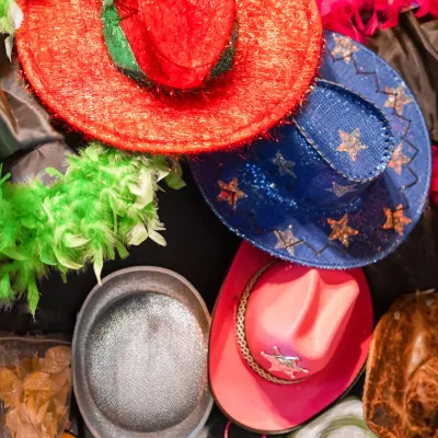 Colorful And Glittery Party Hats Hanging In The Sh 2026 03 17 17 45 30 Utc