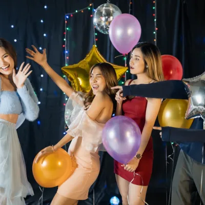 Festive Friends Celebrate With Balloons At A Party 2026 03 24 22 42 52 Utc