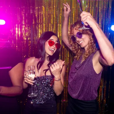Excited Women Celebrating With Champagne At Party 2026 03 25 07 23 33 Utc