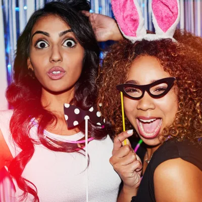 Two Women With Party Props Having Fun 2026 03 25 02 19 45 Utc