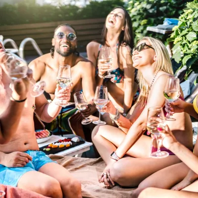 Diverse Friends Drinking White Wine Champagne At S 2026 01 05 00 24 02 Utc