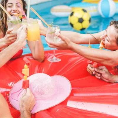 Happy Friends Drinking Cocktails And Eating Tropic 2026 03 26 03 58 03 Utc