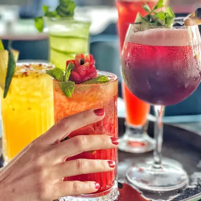 Colorful Cocktails Garnished With Fruit On A Tray 2026 01 08 07 37 23 Utc